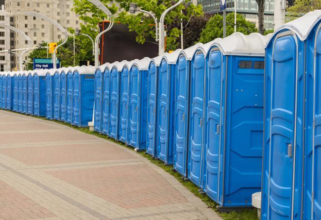 a line of portable restrooms at a sporting event, providing athletes and spectators with clean and accessible facilities in Gurnee, IL